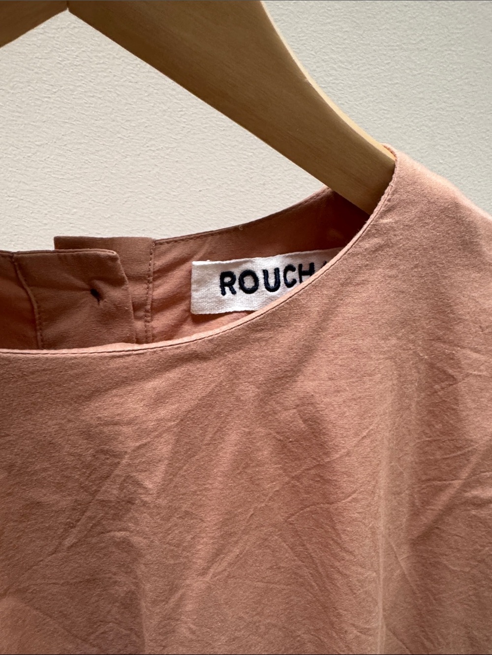 Roucha structured button back tee